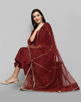 Maroon boat neck kurta paired with elasticated pants and an organza dupatta - a stylish set of three for a sophisticated and coordinated look