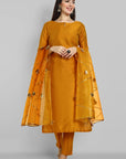 Mustard key hole boat neck kurta paired with elasticated pants and an organza dupatta - a stylish set of three for a sophisticated and coordinated look