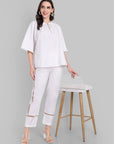 Classic White Straight-Fit Pants with Delicate Lace Inlays