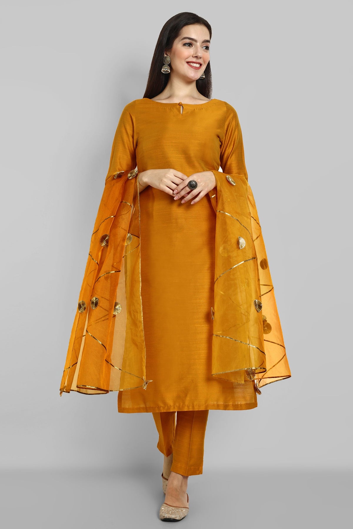 Mustard key hole boat neck kurta paired with elasticated pants and an organza dupatta - a stylish set of three for a sophisticated and coordinated look
